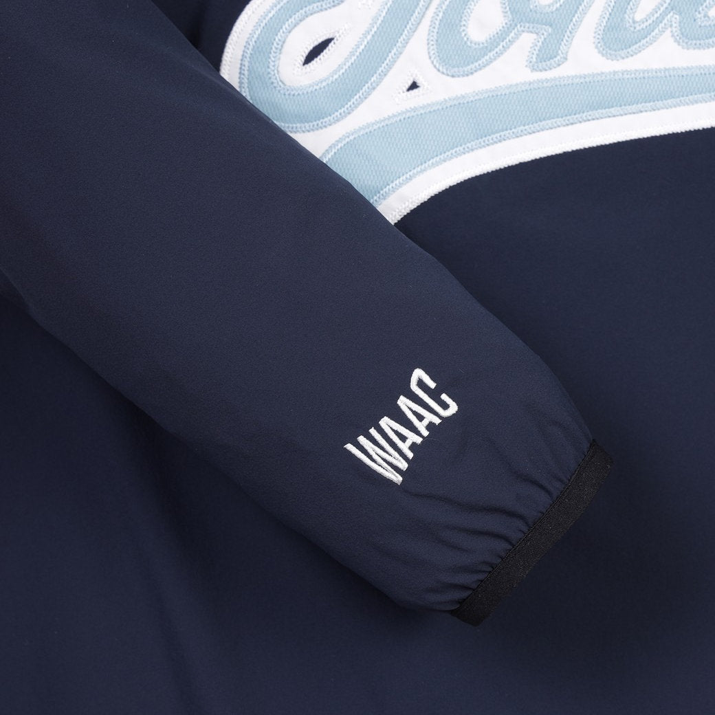 WAAC X JONES】WOMEN カーブロゴプルオーバー ネイビー