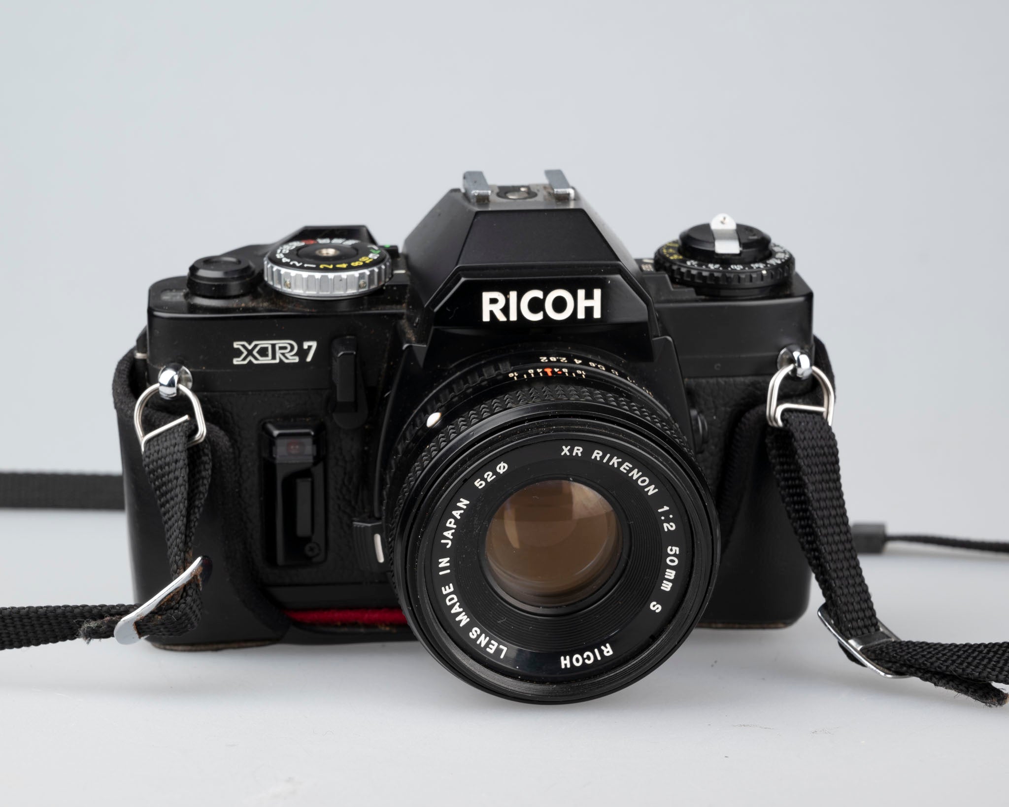 Ricoh XR-7 35mm SLR + XR Rikenon 50mm 1:2 lens + ever-ready case