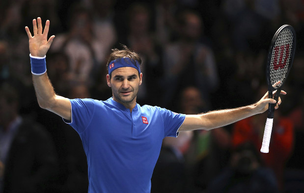Tennis: Federer advances to record-extending 15th ATP Finals semi