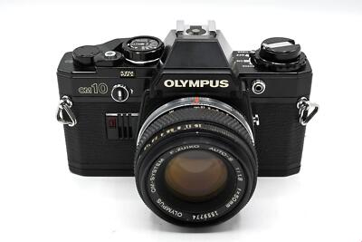 Olympus OM-10 Manual Camera+ Optional 50mm f/1.8 OM Lens in Chrome