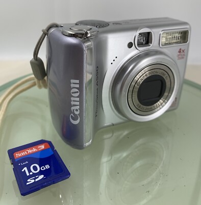 CANON POWERSHOT A550 7.1MP CAMERA WITH 1.0GB SD CARD SILVER TESTED
