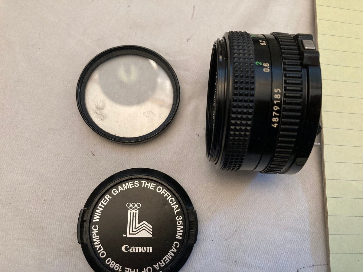 Canon Lens FD 50mm 1:1.8 lens cover and 52mm skylight filter JAPAN