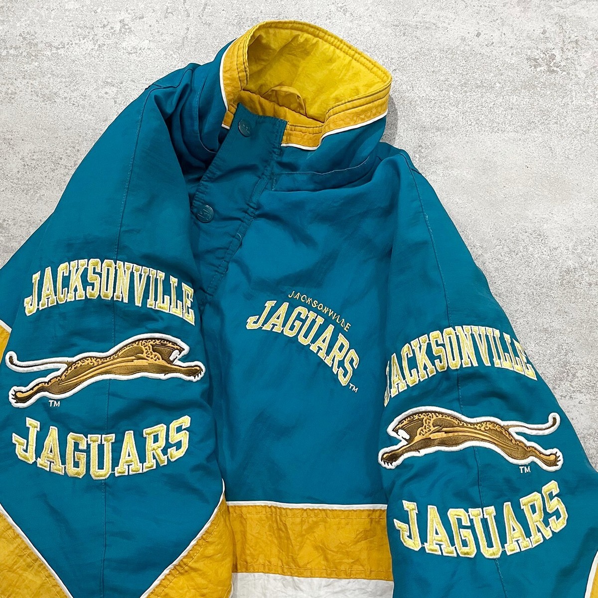 VTG 90s NFL JACKSONVILLE JAGUARS LOGO STARTER PUFFER JACKET SIZE