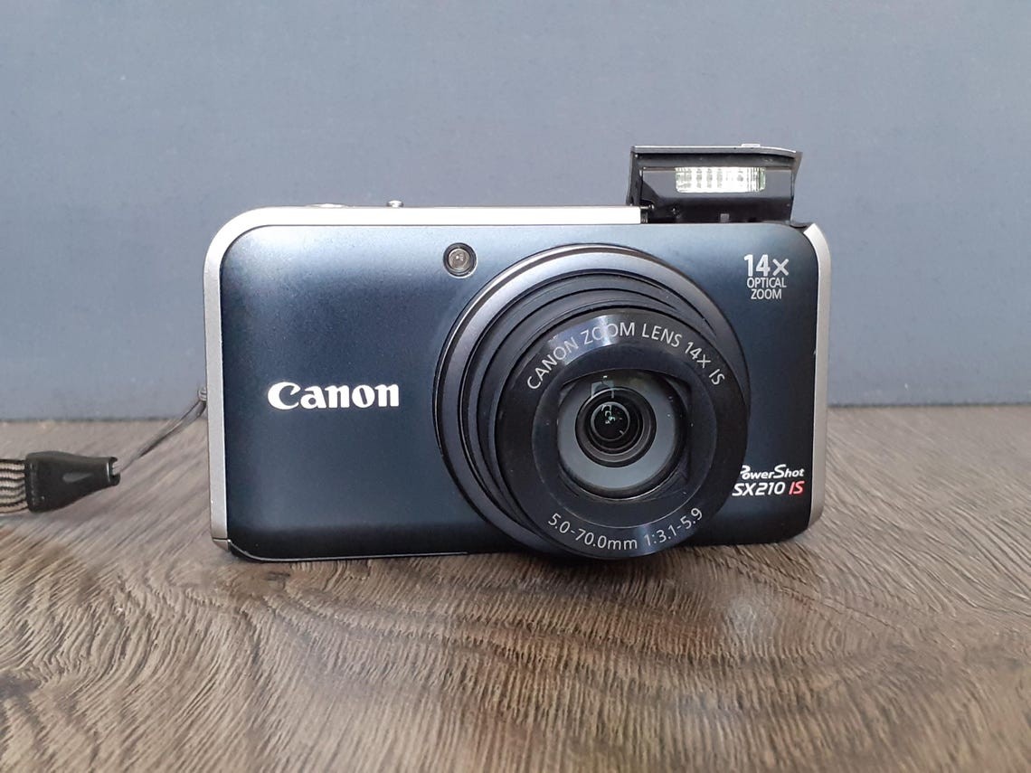 Canon PowerShot SX210 IS 14.1MP 14x Zoom Digital Camera W