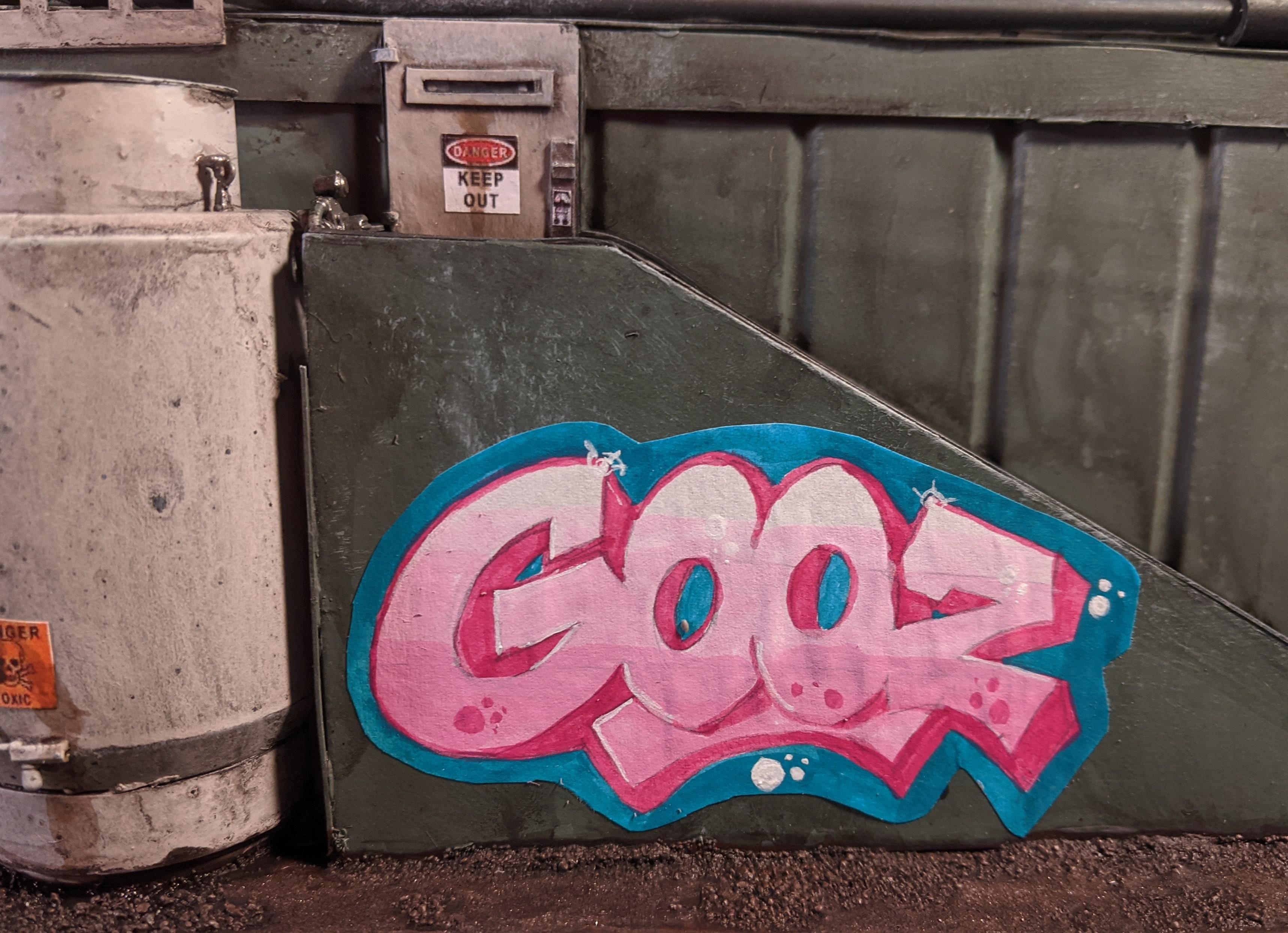 落書きを、貼り付けた紙じゃなくて、壁の一部に見せたいんだよね。風化