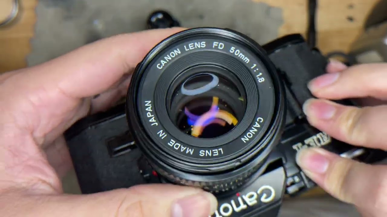 How to use Canon Ae1 NFD 50 1.8 Black Version - YouTube