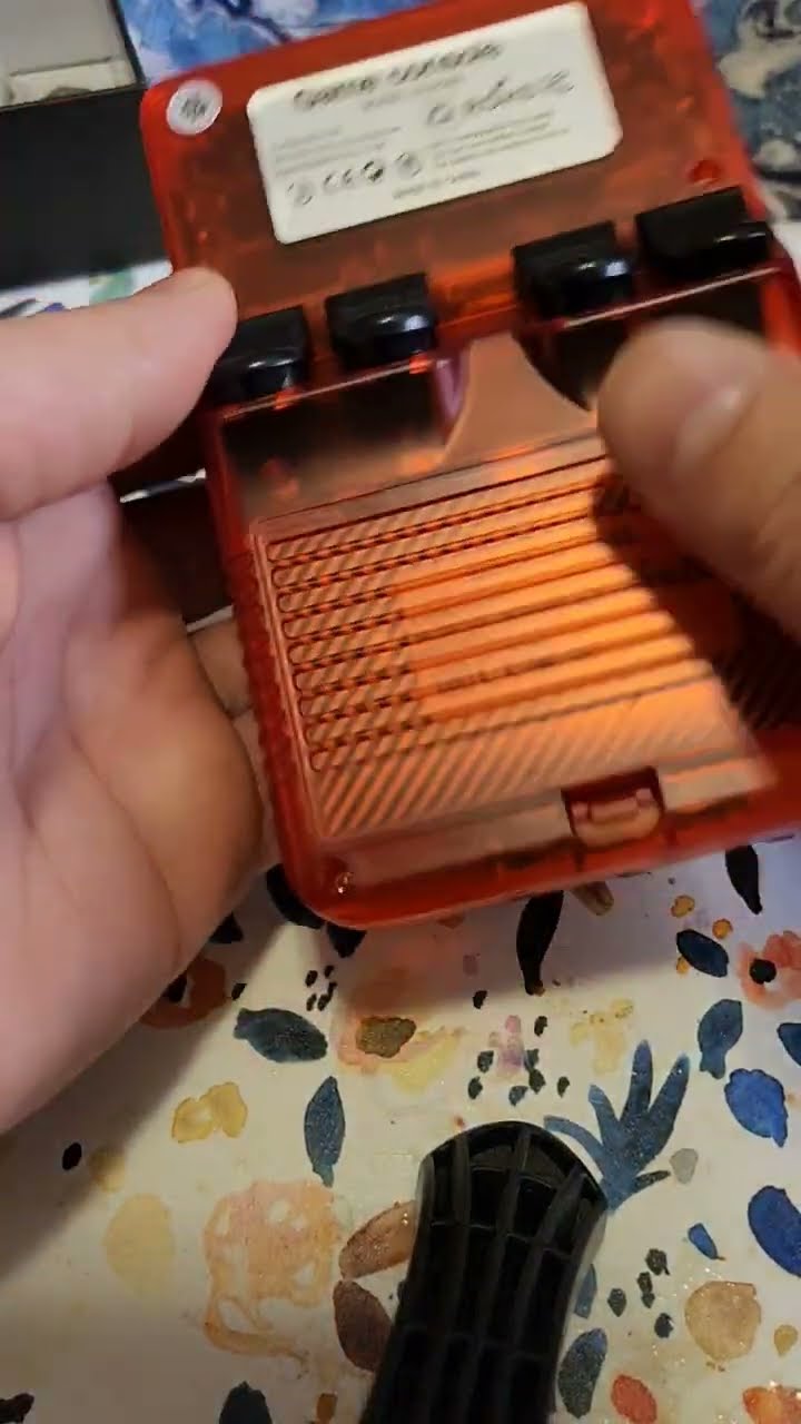 Clone Versus Authentic r36s breakdown. #handheldgames #r36s