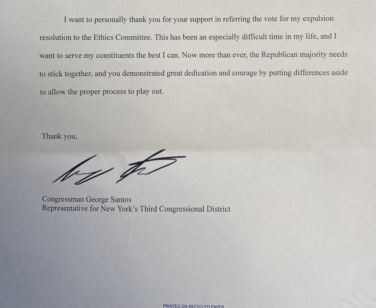 Rep. SANTOS giving thank you letters to members for voting to