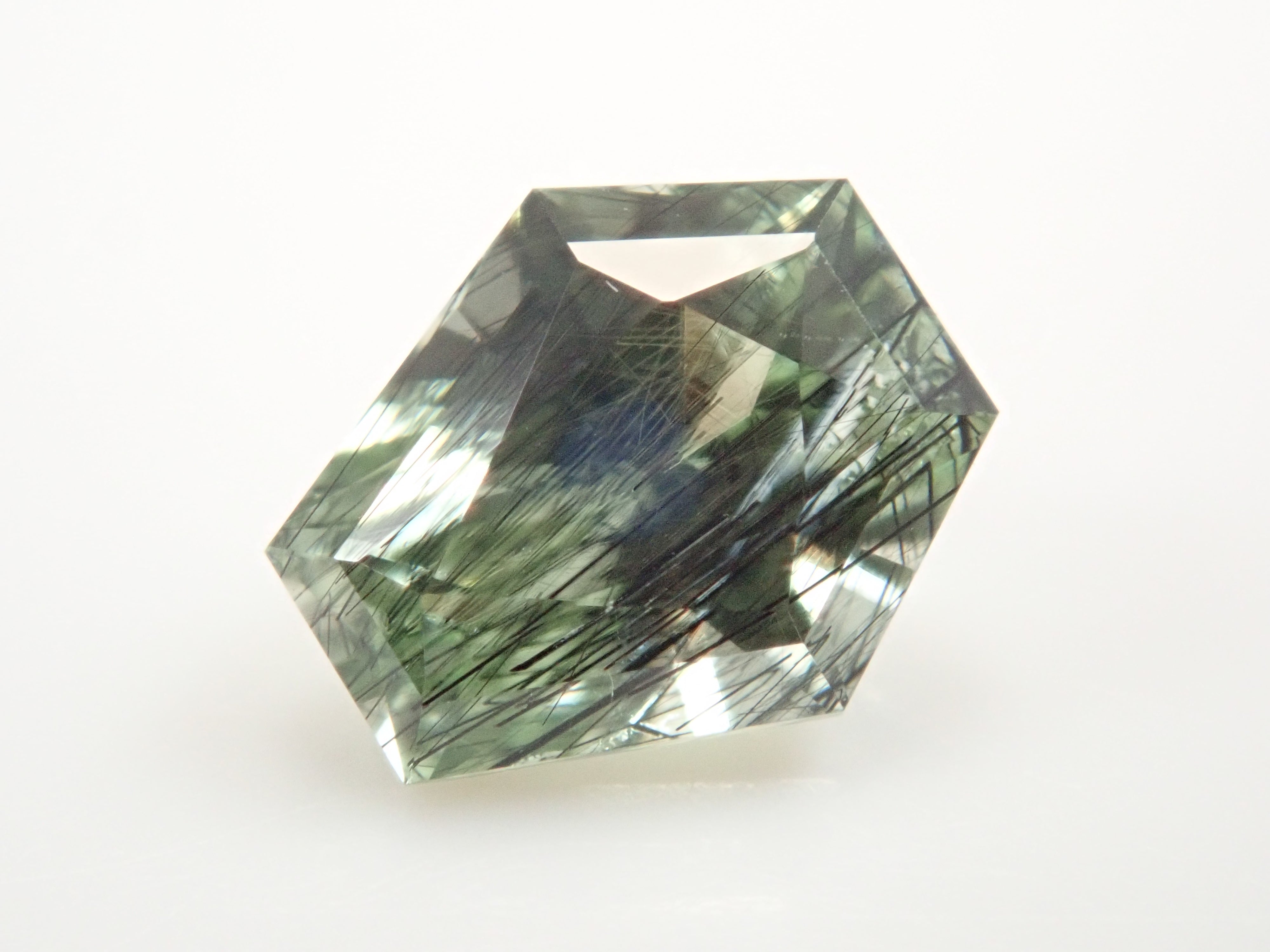 パキスタン産ルードヴィッヒアイトインペリドット 0.609ctルース